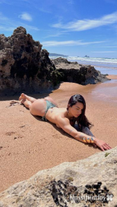 Mía brasileira tatuada
